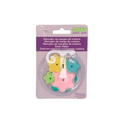 Marcadores de margem de costura coloridos em forma de estrela e coração num cartão de embalagem