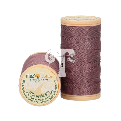 Dois rolos de linha de algodão roxo escuro com etiquetas redondas