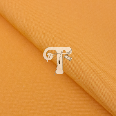 Tecido laranja com símbolo branco de agulha e linha em forma de letra T