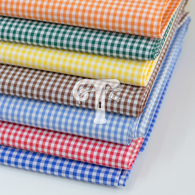 tecidos xadrez coloridos empilhados