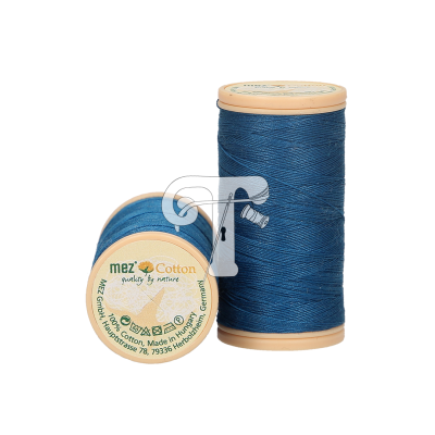 Carretéis de linha de algodão azul escuro mez Cotton com etiquetas visíveis