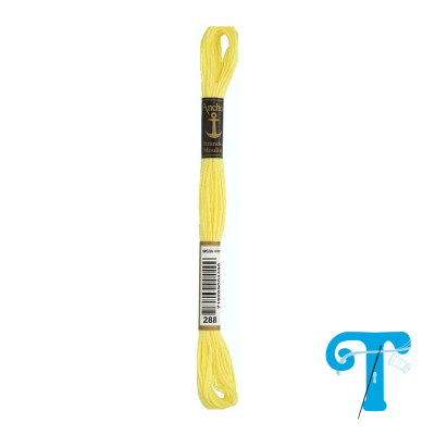 Skein of yellow embroidery floss with black labels and barcode on white background