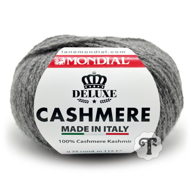 Novelo de lã cinzenta cashmere da marca MONDIAL Deluxe com etiqueta branca e vermelha