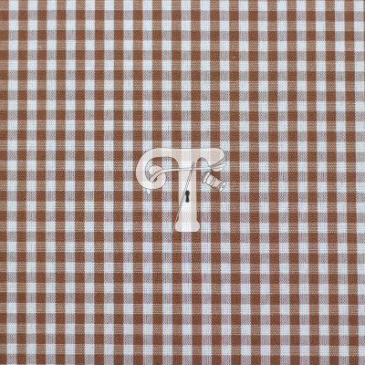 Tecido xadrez castanho e branco em padrão de quadrados pequenos