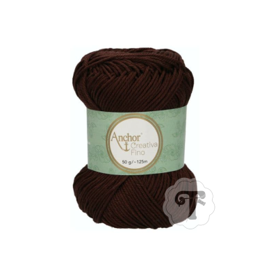 Novelo de lã castanha escura Anchor Creativa Fino com etiqueta verde clara.