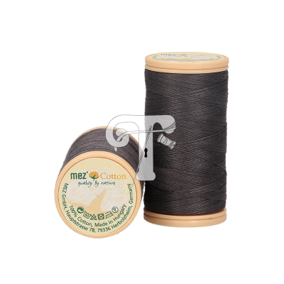 Dois carretéis de linha preta mez Cotton com rótulo em alemão