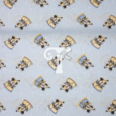 Tecido azul com padrão de cães desenhados e pontos brancos