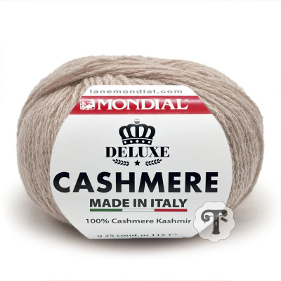 Novelo de lã bege claro com etiqueta MONDIAL Deluxe Cashmere