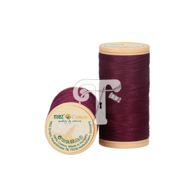 Dois carretéis de linha de algodão cor vinho da marca mez Cotton com rótulos visíveis.