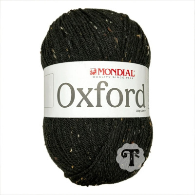 Novelo de lã preta com pequenos pontos coloridos, etiqueta MONDIAL Oxford