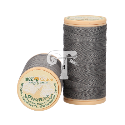 Dois carretéis de linha cinza escura com rótulo redondo