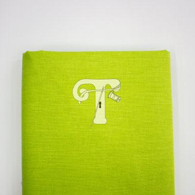 Capa verde limão com design de costura em forma de letra T