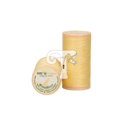 Dois carretéis amarelos de linha de algodão Mez com etiquetas visíveis