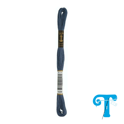 Novelo de linha azul escura para bordar com rótulo e código de barras