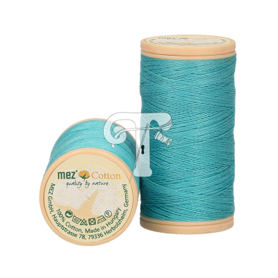 Dois carretéis de linha azul turquesa da marca mez Cotton, feitos de algodão