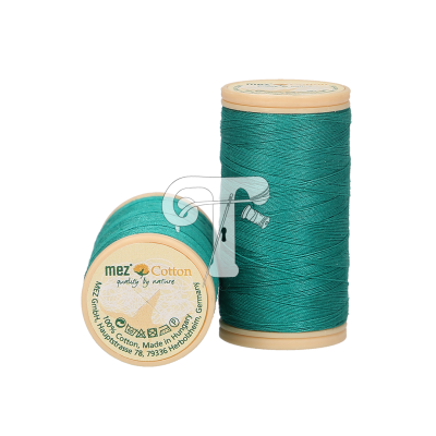 Duas bobinas de linha de costura azul-turquesa mez Cotton