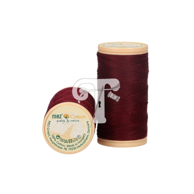 Dois carretéis de linha de algodão cor vinho com rótulos redondos