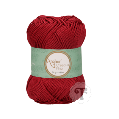 Novelo de fio vermelho com etiqueta verde