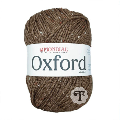 Novelo de lã castanha com pontos brancos e vermelhos da marca MONDIAL Oxford