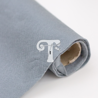 Rolo de tecido cinza azulado com textura suave