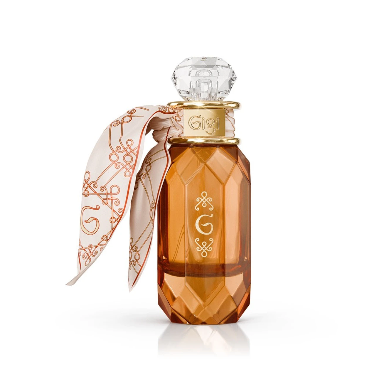 Frasco de perfume âmbar com tampa transparente e lenço branco com padrão laranja.