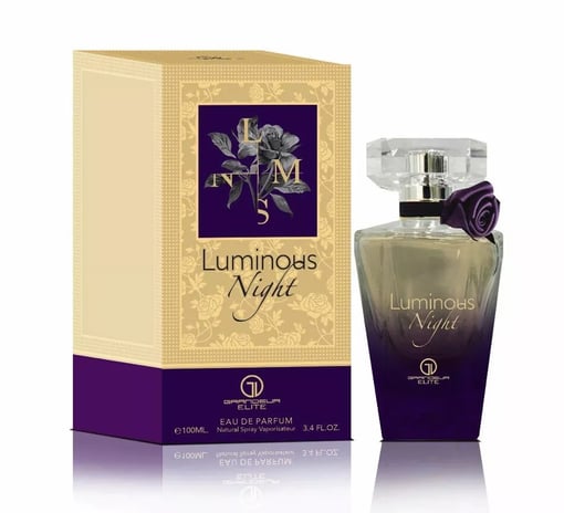 Perfume Luminous Night com frasco degradê cinza e roxo e embalagem bege com detalhes roxos