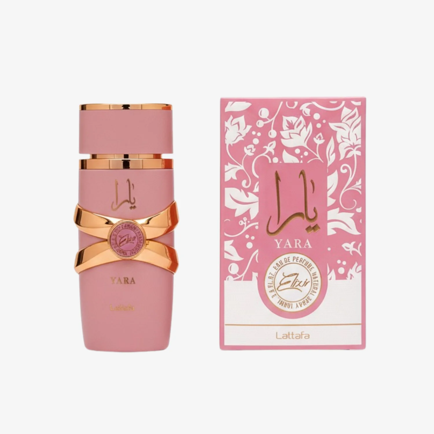 Frasco e caixa de perfume rosa com detalhes dourados e padrão floral branco.