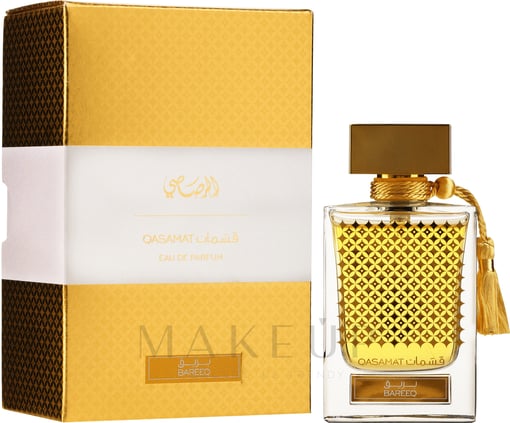 Frasco de perfume dourado com caixa amarela e branca