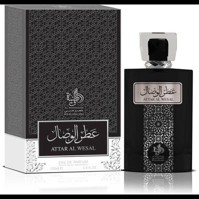 Frasco de perfume preto com padrão geométrico e texto ATTAR AL WESAL com caixa correspondente