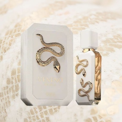 Perfume com frasco branco e dourado e embalagem com serpente e texto 'VENENO BLANCO'