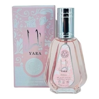 Frasco de perfume YARA com líquido rosa ao lado da caixa rosa decorada