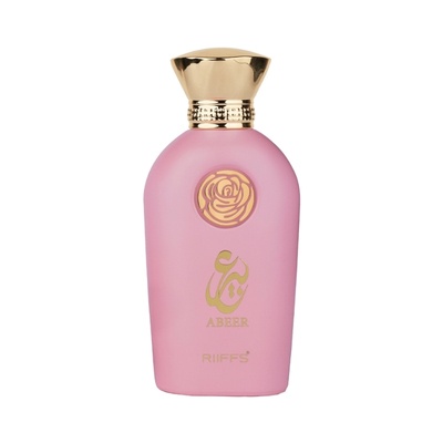 Frasco de perfume rosa com tampa dourada e detalhes dourados