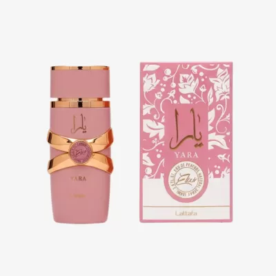 Frasco e caixa de perfume rosa com detalhes dourados e padrão floral branco.