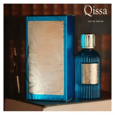 Frasco de perfume azul e embalagem azul com detalhes dourados e padrão floral