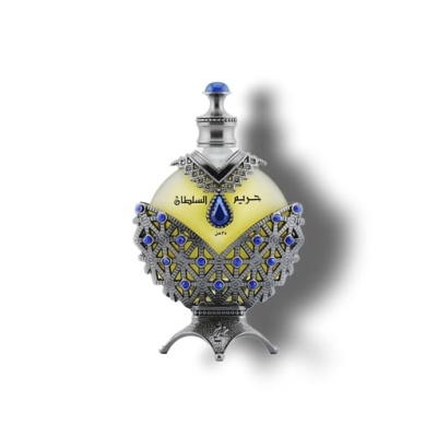 Frasco decorativo de perfume amarelo com detalhes metálicos prateados e azuis