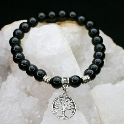 Pulseira preta com pendente árvore da vida sobre cristais brancos