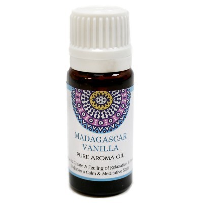 Frasco pequeno de vidro castanho com tampa branca e rótulo colorido de óleo aromático de baunilha