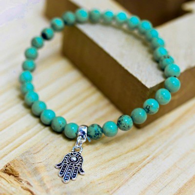 https://www.andreyadreams.com/product/pulseira-turquesa-com-mao-de-fatima