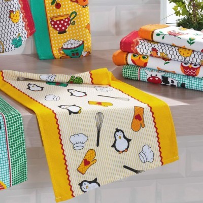 Toalhas de cozinha coloridas com estampas de pinguins, chapéus de chef e utensílios