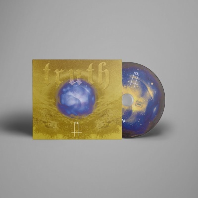 Caixa dourada com texto truth e uma esfera azul, com CD decorado a azul e dourado