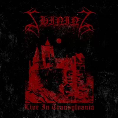 Capa de álbum preta com castelo vermelho e textos 'SHINING' e 'Live In Transylvania'