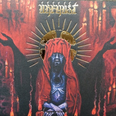Capa de álbum com figura azul de capuz vermelho e auréola dourada em fundo vermelho e preto