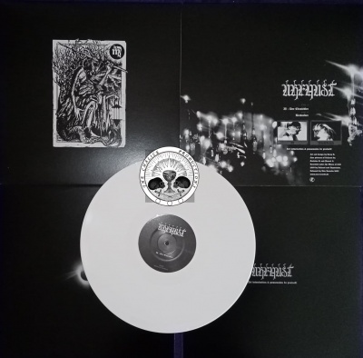 Disco de vinil branco com encarte preto e branco de banda UNHEILIG