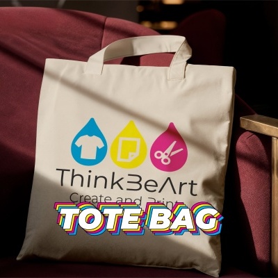 Saco tote de tecido bege com design colorido e texto ThinkBeArt