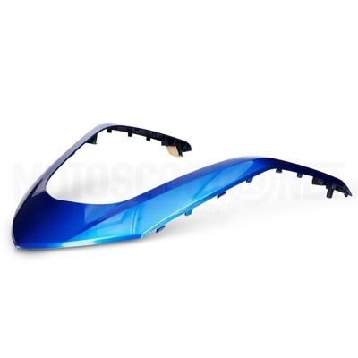 Peça para motocicleta em plástico azul metálico em fundo branco