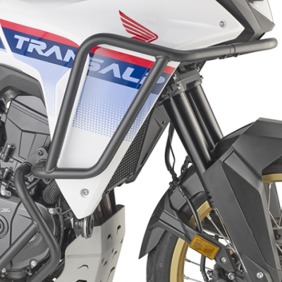 Parte da moto branca com estrutura metálica preta e texto TRANSALP