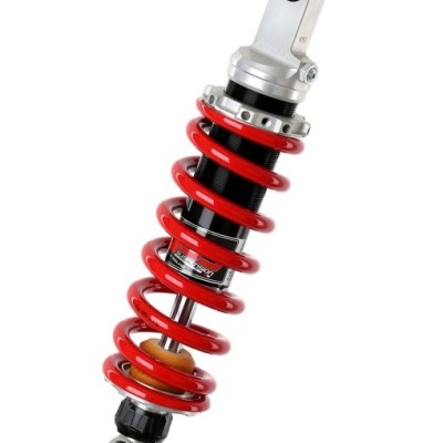 amortecedor com mola helicoidal vermelha e componentes metálicos