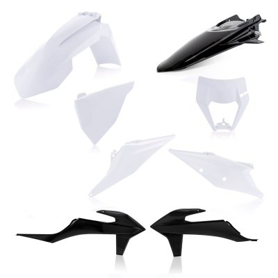 Peças plásticas de moto preto e branco sobre fundo branco