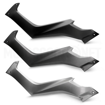 Três peças de plástico para motocicleta em preto fosco, preto mate e cinza com design angular.