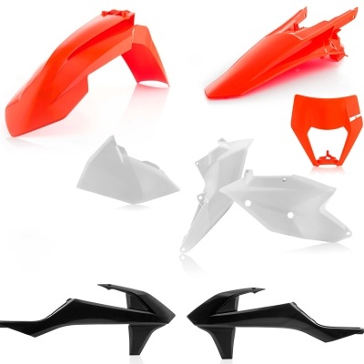 Peças plásticas para motocicleta em várias cores sobre fundo branco